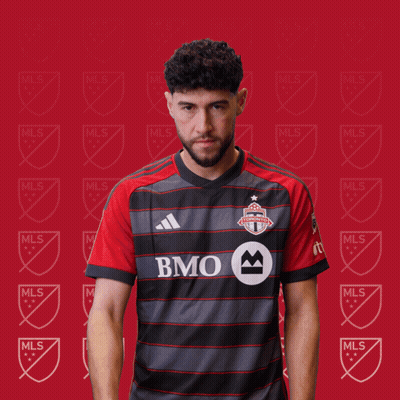 A Man In A Bmo Jersey Holds A Red Card GIF