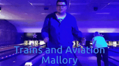 A Man In A Bowling Alley With The Words Trains And Aviation Mallory GIF
