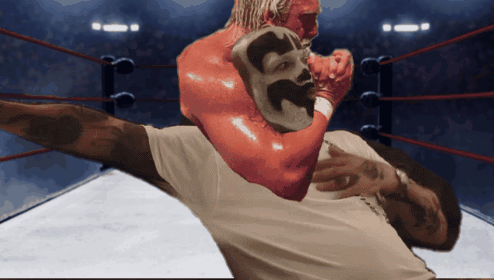 A Man In A Boxing Ring Has A Red Glove With The Number 32 On It GIF