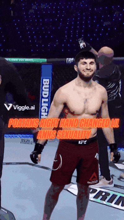 A Man In A Boxing Ring With A Bud Light Banner In The Background GIF