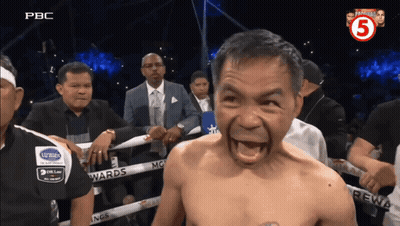 A Man In A Boxing Ring With The Number 5 On The Corner GIF