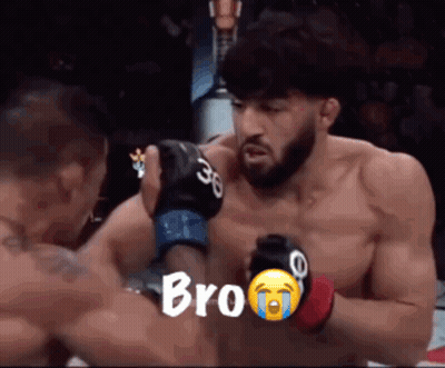 A Man In A Boxing Ring With The Word Bro Written On The Screen GIF