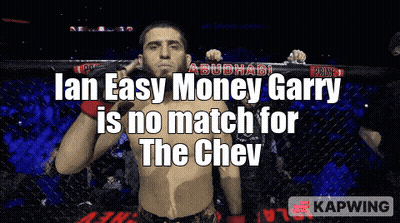 A Man In A Boxing Ring With The Words " Ian Easy Money Garry Is No Match For The Chev " GIF