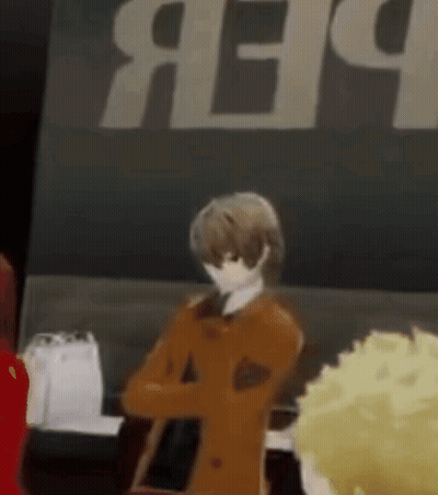 A Man In A Brown Coat Is Standing In Front Of A Sign That Says ' Aep ' On It . GIF
