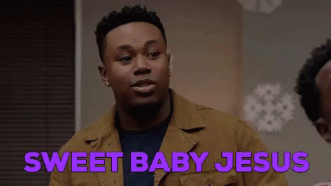 A Man In A Brown Jacket Is Saying Sweet Baby Jesus . GIF