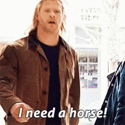 A Man In A Brown Jacket Says I Need A Horse . GIF