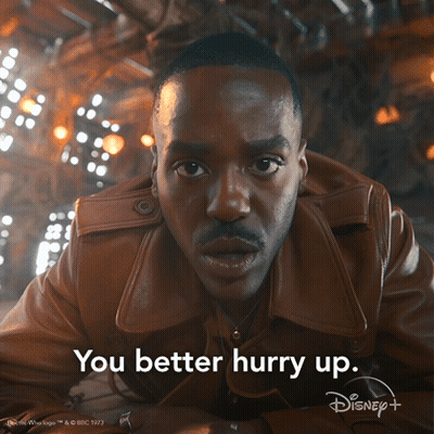 A Man In A Brown Jacket Says You Better Hurry Up On A Disney + Ad GIF