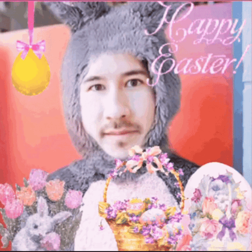 A Man In A Bunny Costume Is Holding An Easter Basket With Flowers GIF
