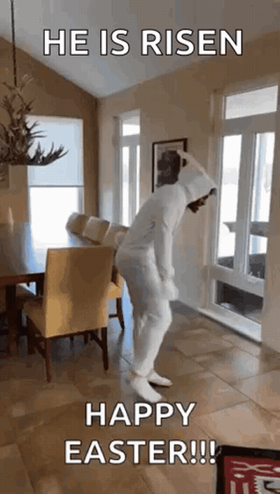A Man In A Bunny Suit Is Dancing In A Living Room . GIF