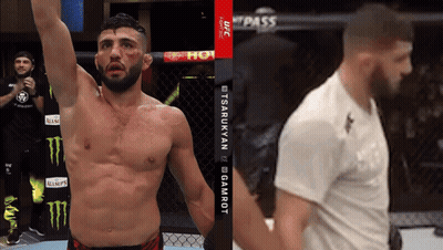 A Man In A Cage With A Monster Energy Logo On The Wall GIF