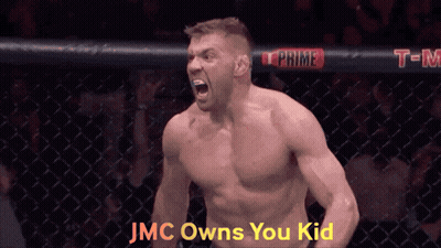 A Man In A Cage With The Words " Jmc Owns You Kid " On The Bottom GIF