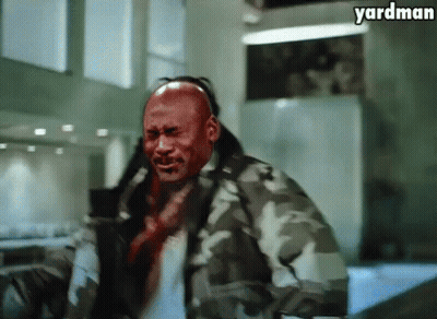 A Man In A Camouflage Jacket Has Blood On His Face And The Words Yardman Above Him GIF