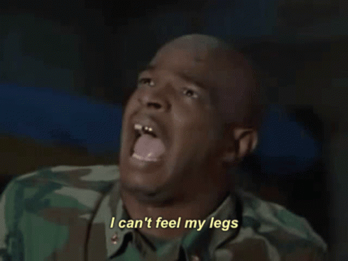 A Man In A Camouflage Shirt Is Screaming And Says I Can 'T Feel My Legs GIF