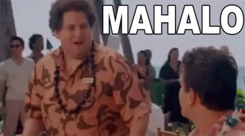 A Man In A Camouflage Shirt Is Talking To Another Man In Front Of A Group Of People . GIF