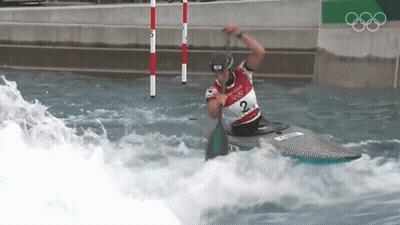 A Man In A Canoe With The Number 2 On His Shirt GIF