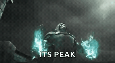 A Man In A Cape Is Holding A Fireball In His Hands And Says `` Its Peak '' . GIF