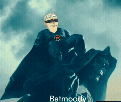 A Man In A Cape With The Word Batmoody On The Bottom Right GIF