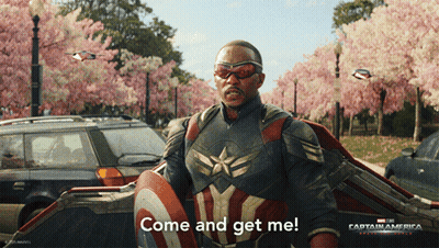 A Man In A Captain America Costume Is Holding A Shield And Saying Come And Get Me GIF