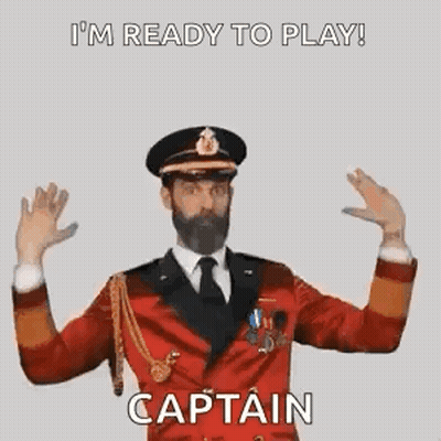 A Man In A Captain 'S Uniform Is Ready To Play A Game . GIF
