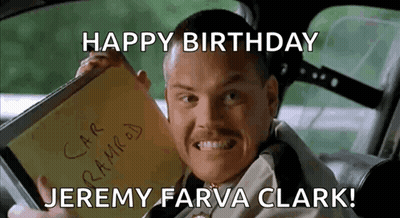 A Man In A Car Holding A Notebook That Says Happy Birthday Jeremy Farva Clark ! GIF