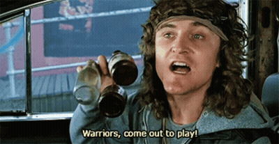 A Man In A Car Is Holding Two Bottles Of Beer And Saying Warriors Come Out To Play GIF