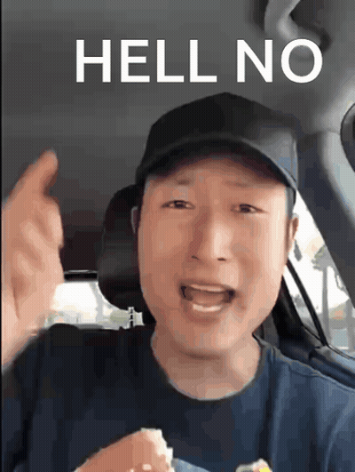 A Man In A Car Says Hell No While Holding A Hamburger GIF