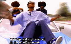 A Man In A Car Says Wake Up Wake Up Wake Up It 'S The 1St Of Tha Month GIF