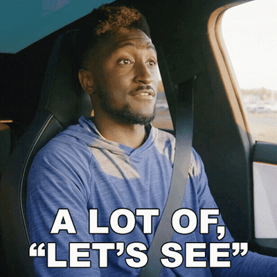A Man In A Car With The Words " A Lot Of Let 'S See " Below Him GIF