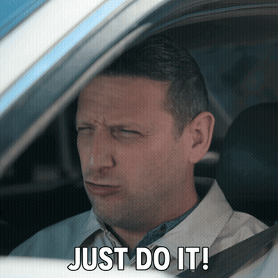 A Man In A Car With The Words Just Do It Written On His Face GIF