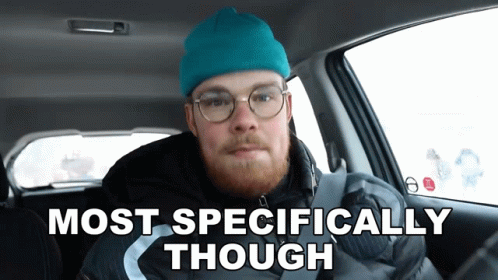 A Man In A Car With The Words Most Specifically Though GIF