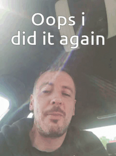 A Man In A Car With The Words Oops I Did It Again On The Bottom GIF