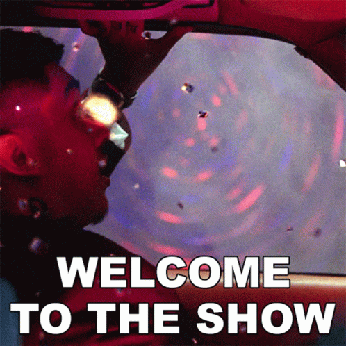 A Man In A Car With The Words Welcome To The Show On The Bottom GIF