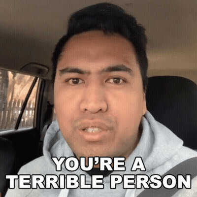 A Man In A Car With The Words " You 'Re A Terrible Person " Above Him GIF