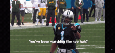 A Man In A Carolina Panthers Uniform Points At The Camera GIF