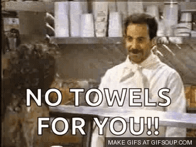 A Man In A Chef 'S Coat Is Standing In A Kitchen And Says `` No Towels For You ! `` GIF