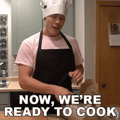 A Man In A Chef 'S Hat And Apron Is Saying Now We 'Re Ready To Cook GIF