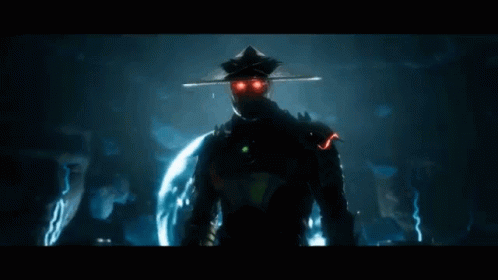A Man In A Chinese Hat Is Holding A Glowing Object In His Hands GIF