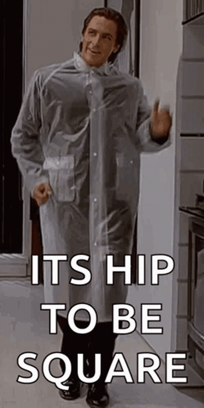 A Man In A Clear Plastic Raincoat Is Standing In Front Of A Refrigerator . GIF