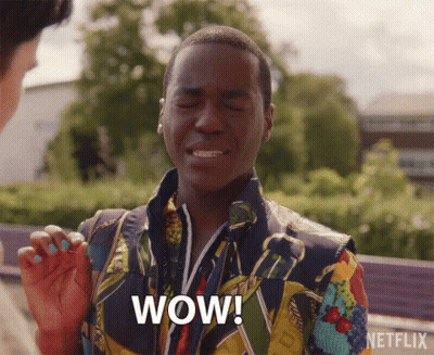 A Man In A Colorful Jacket Says Wow In A Netflix Ad GIF