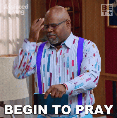 A Man In A Colorful Shirt And Suspenders Is Holding A Book And Says Begin To Pray GIF