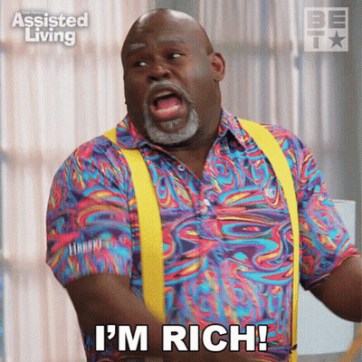 A Man In A Colorful Shirt And Yellow Suspenders Says I 'M Rich GIF
