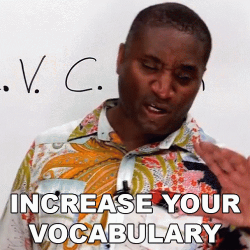 A Man In A Colorful Shirt Says " Increase Your Vocabulary " In Front Of A Whiteboard GIF