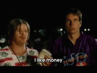 A Man In A Colorful Shirt Says That He Likes Money GIF