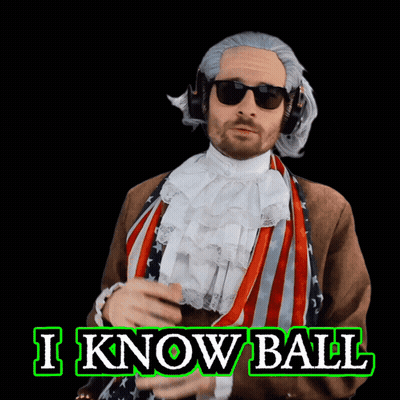 A Man In A Confederate Flag Costume Is Holding A Basketball In Front Of A Sign That Says I Know Ball GIF