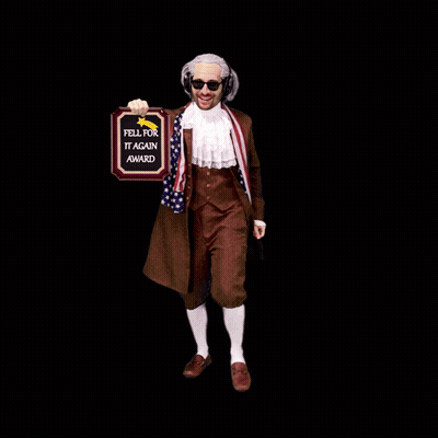A Man In A Costume Holds Up A Plaque That Says Fell For It Again Award GIF