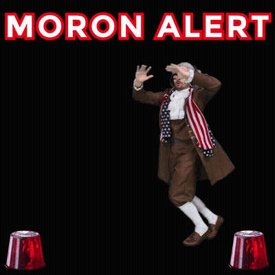 A Man In A Costume Is Dancing In Front Of A Sign That Says " Moron Alert " GIF