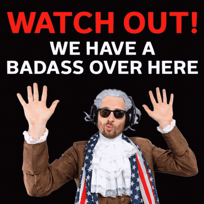 A Man In A Costume With Headphones Says Watch Out We Have A Badass Over Here On A Black Background GIF
