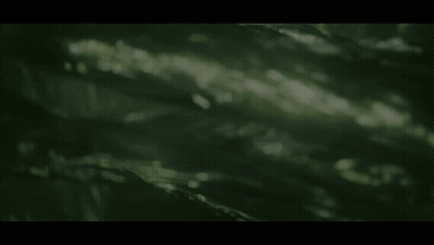 A Man In A Cowboy Hat Is Behind A Barbed Wire Fence GIF