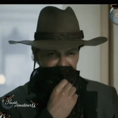 A Man In A Cowboy Hat Is Covering His Face With A Bandana And The Words Pandill Aventurar U. On The Bottom GIF