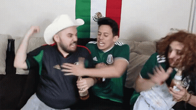A Man In A Cowboy Hat Is Holding A Beer GIF